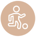 Simple icon of a person kicking a soccer ball, depicted in white on a light brown circular background.